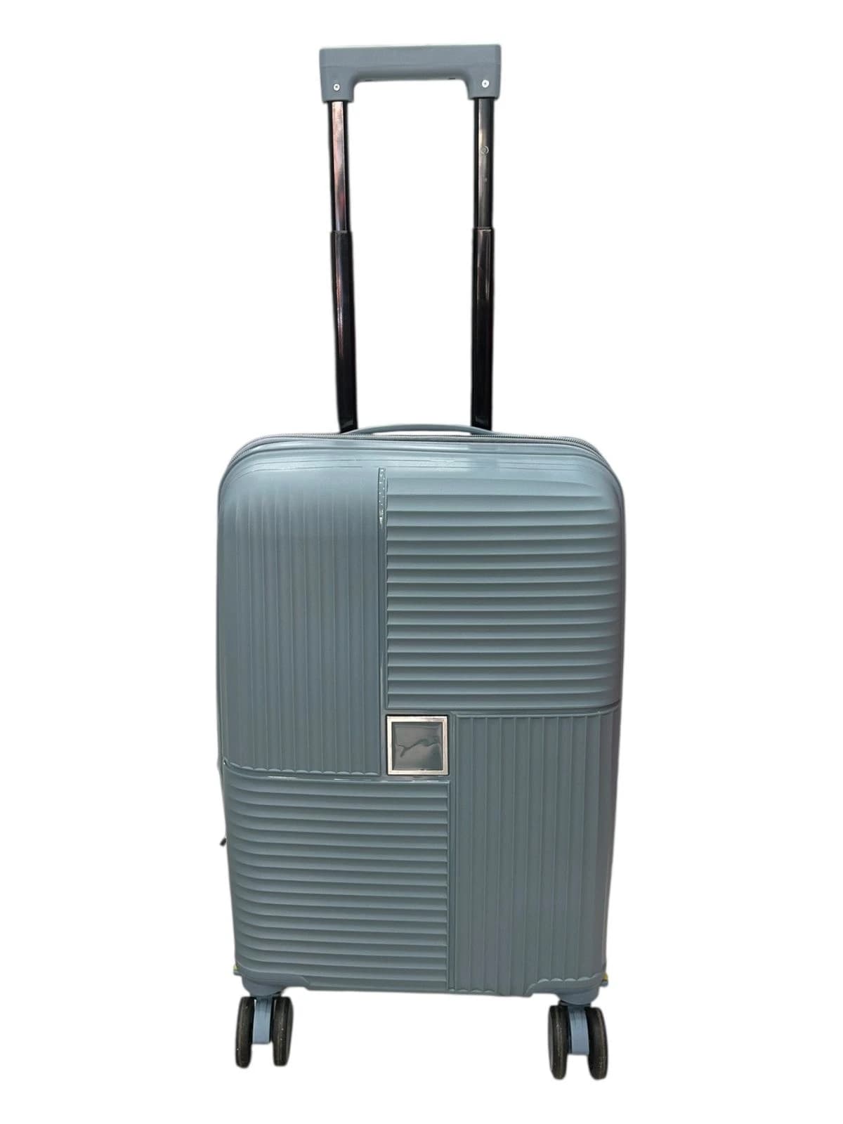 DUDLEY VALIJA 55CM CELESTE | RIGÍDA, 4 RUEDAS, LIVIANA